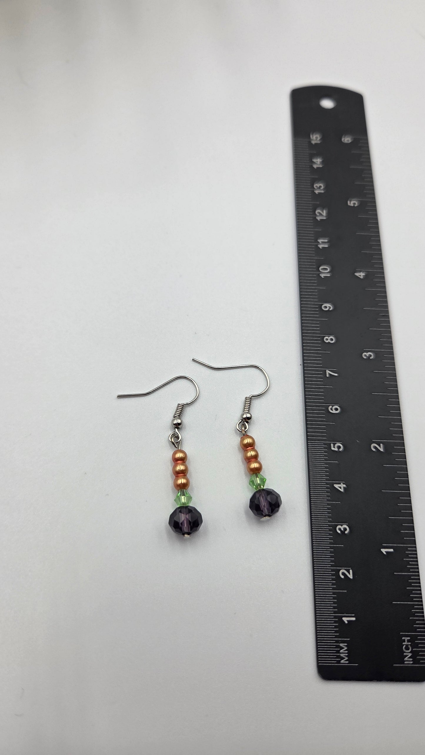 Boucles d'oreilles en perles "dorées,vertes et mauves"