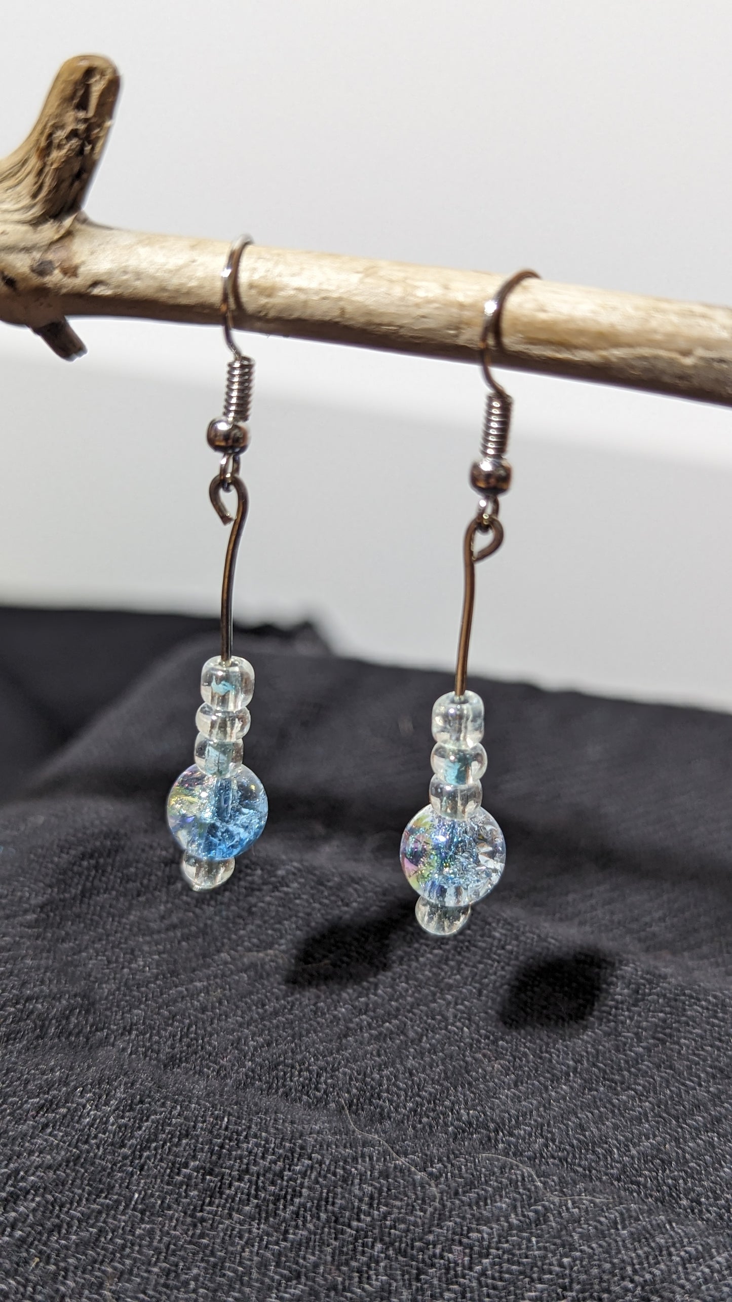 Translucent sky blue pearl earrings.