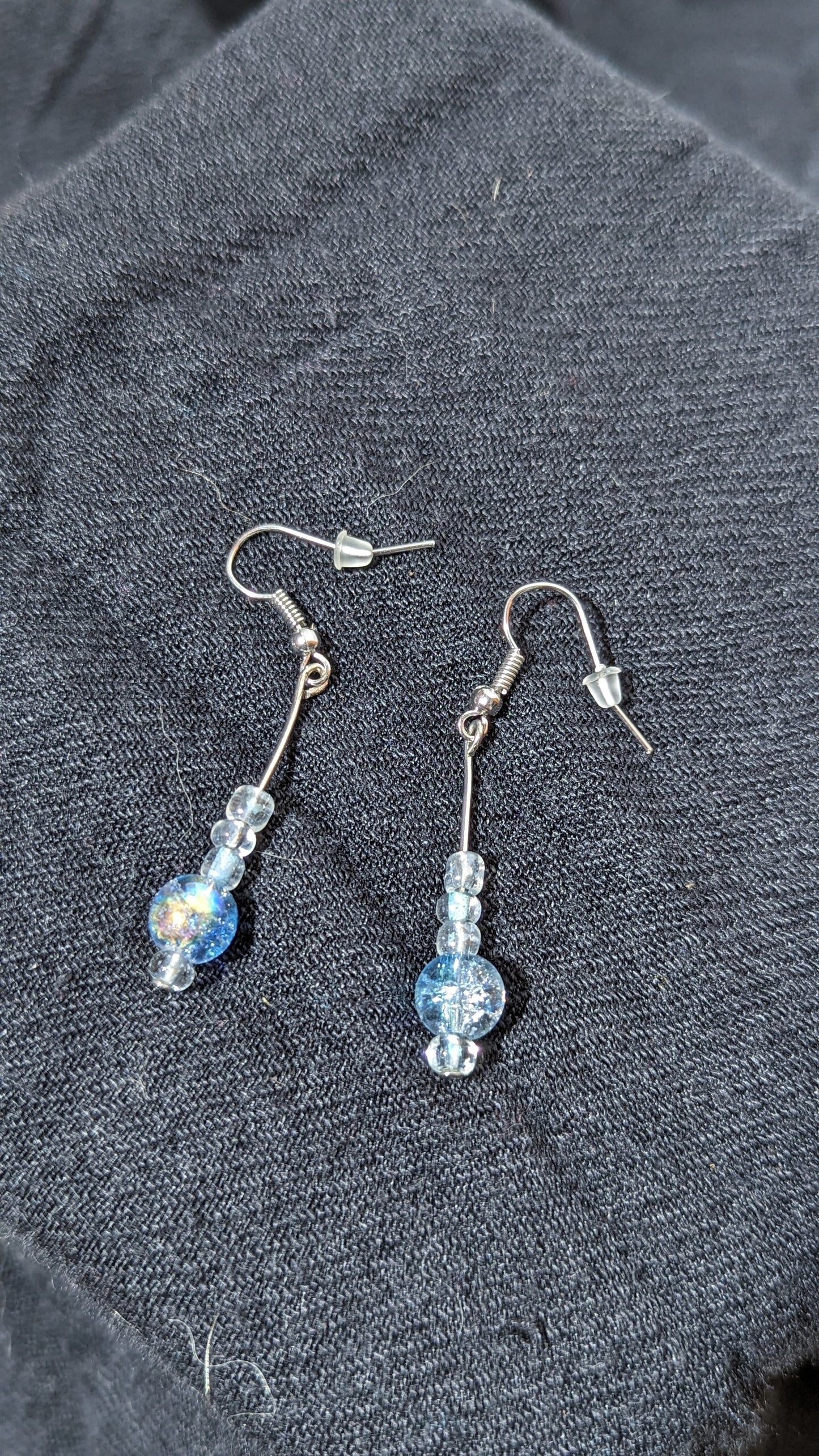 Translucent sky blue pearl earrings.