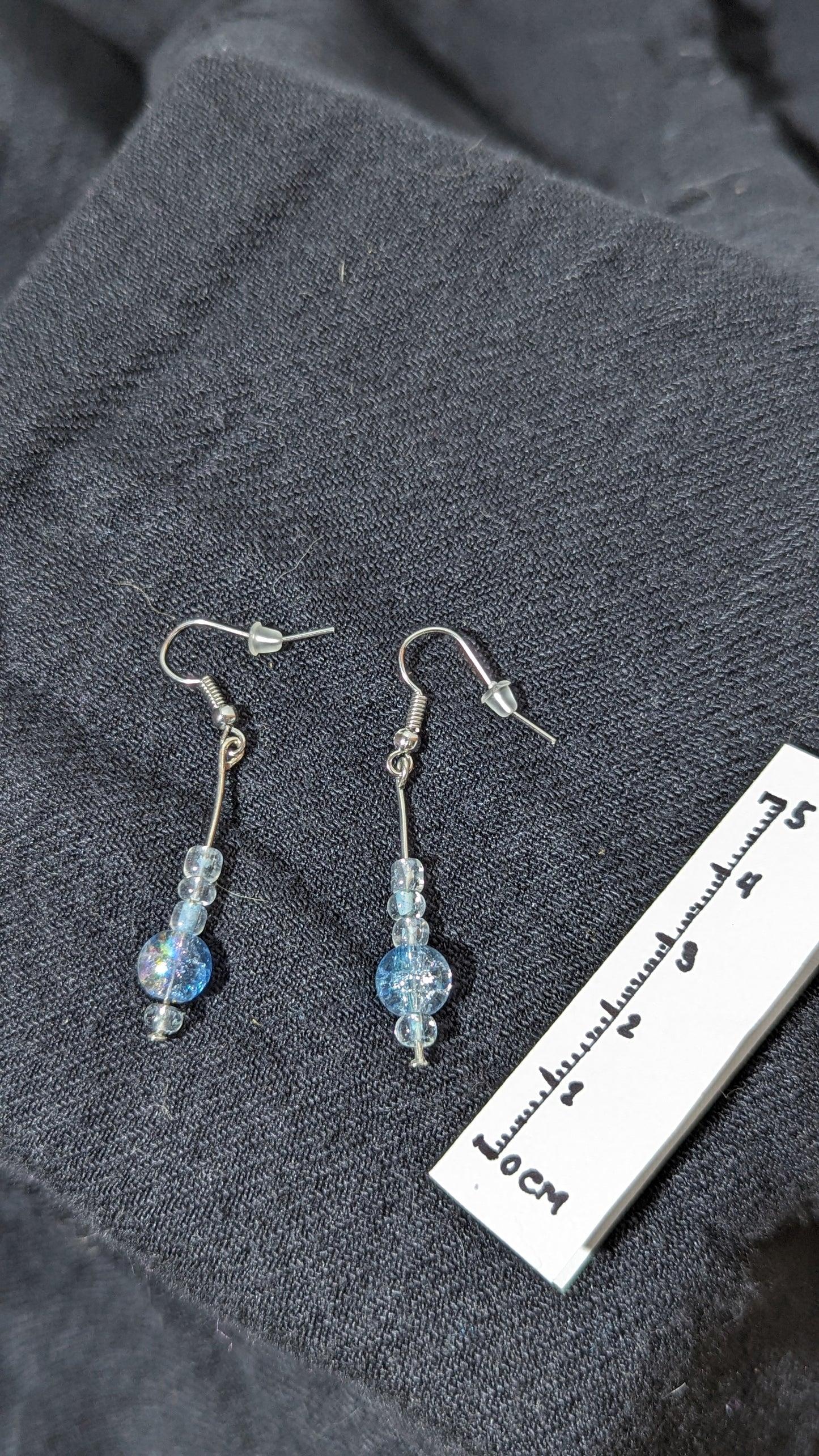 Translucent sky blue pearl earrings.