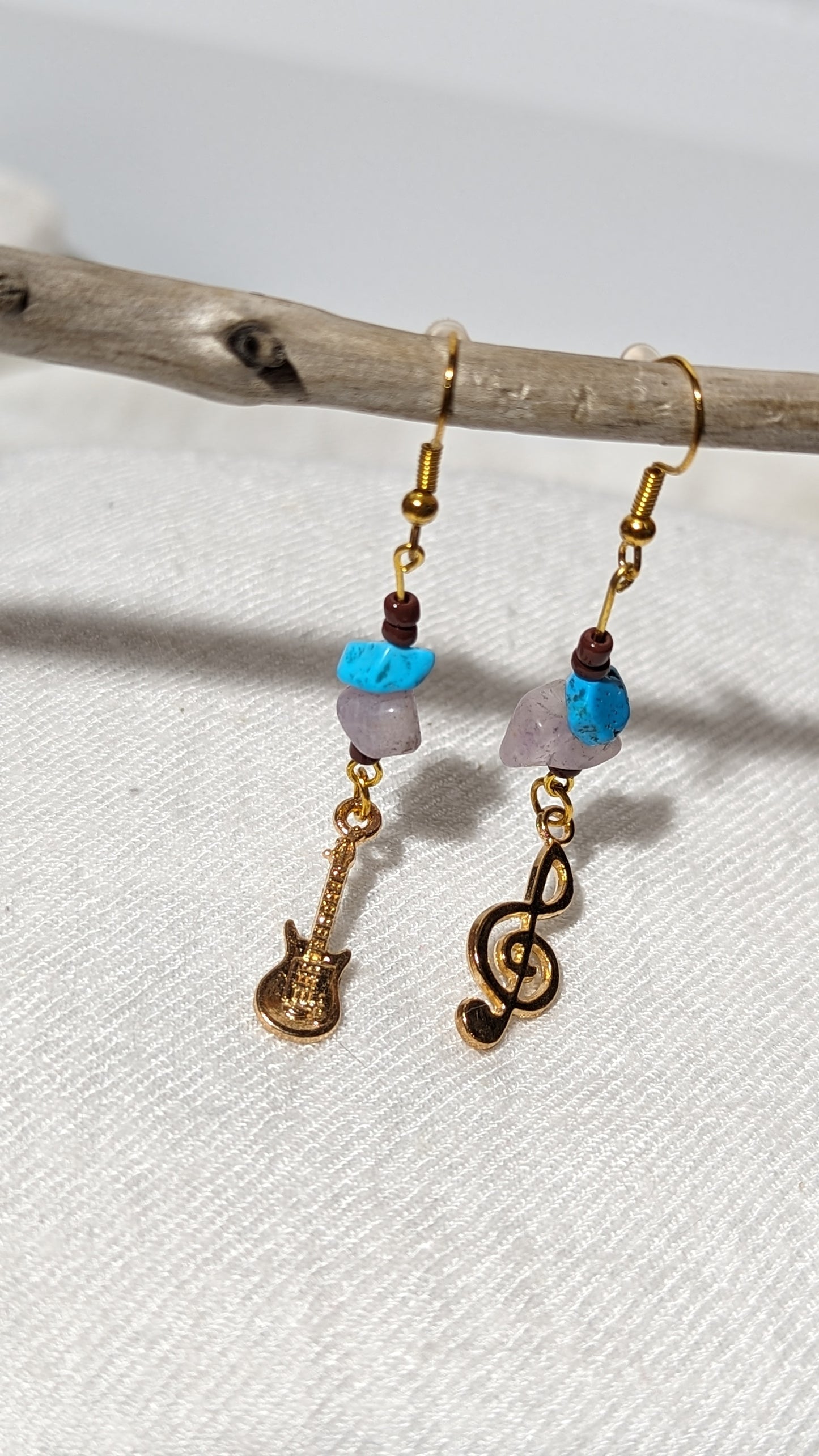 Blue/pink gemstone earrings with “musical theme” pendant