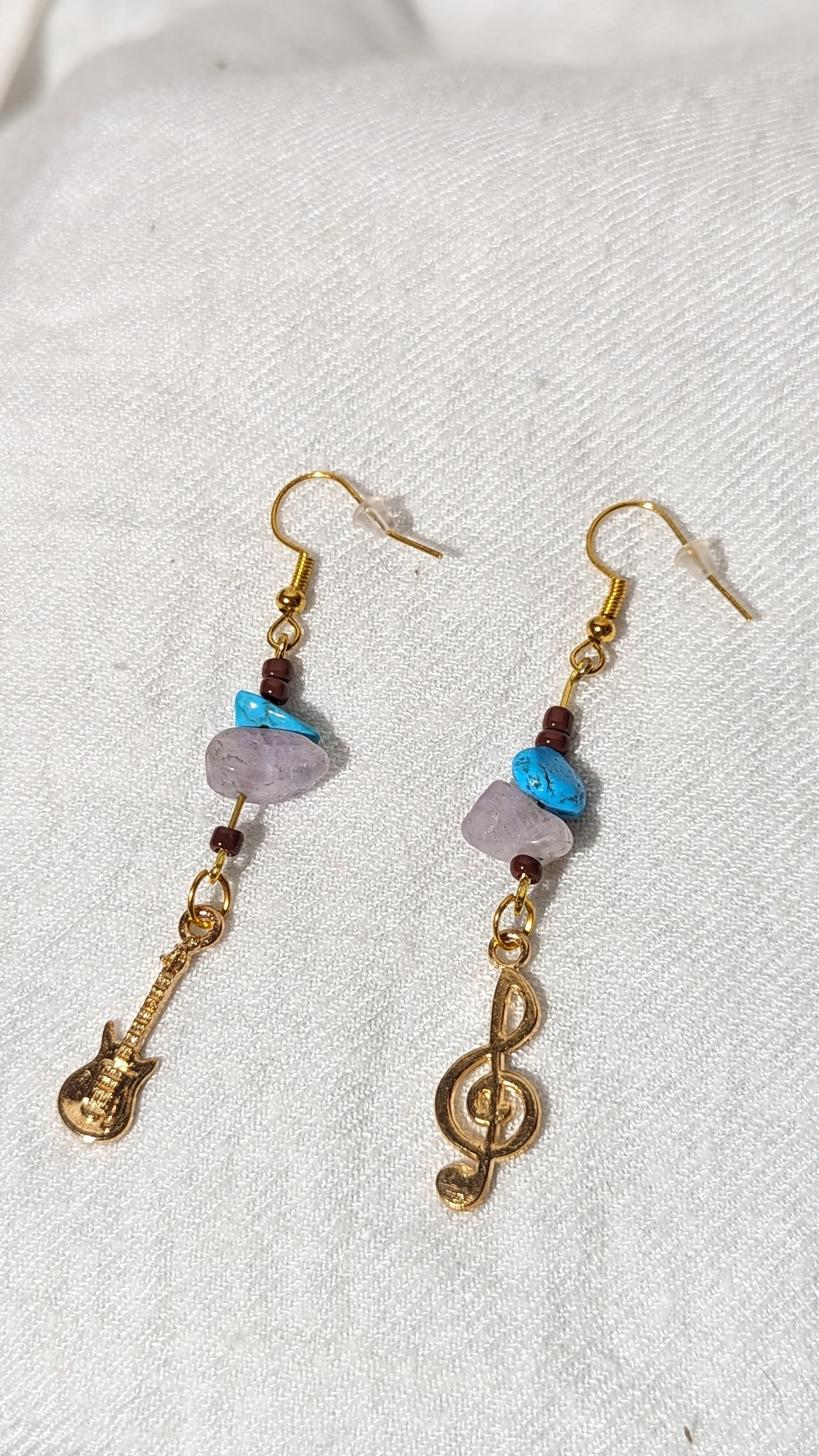 Blue/pink gemstone earrings with “musical theme” pendant