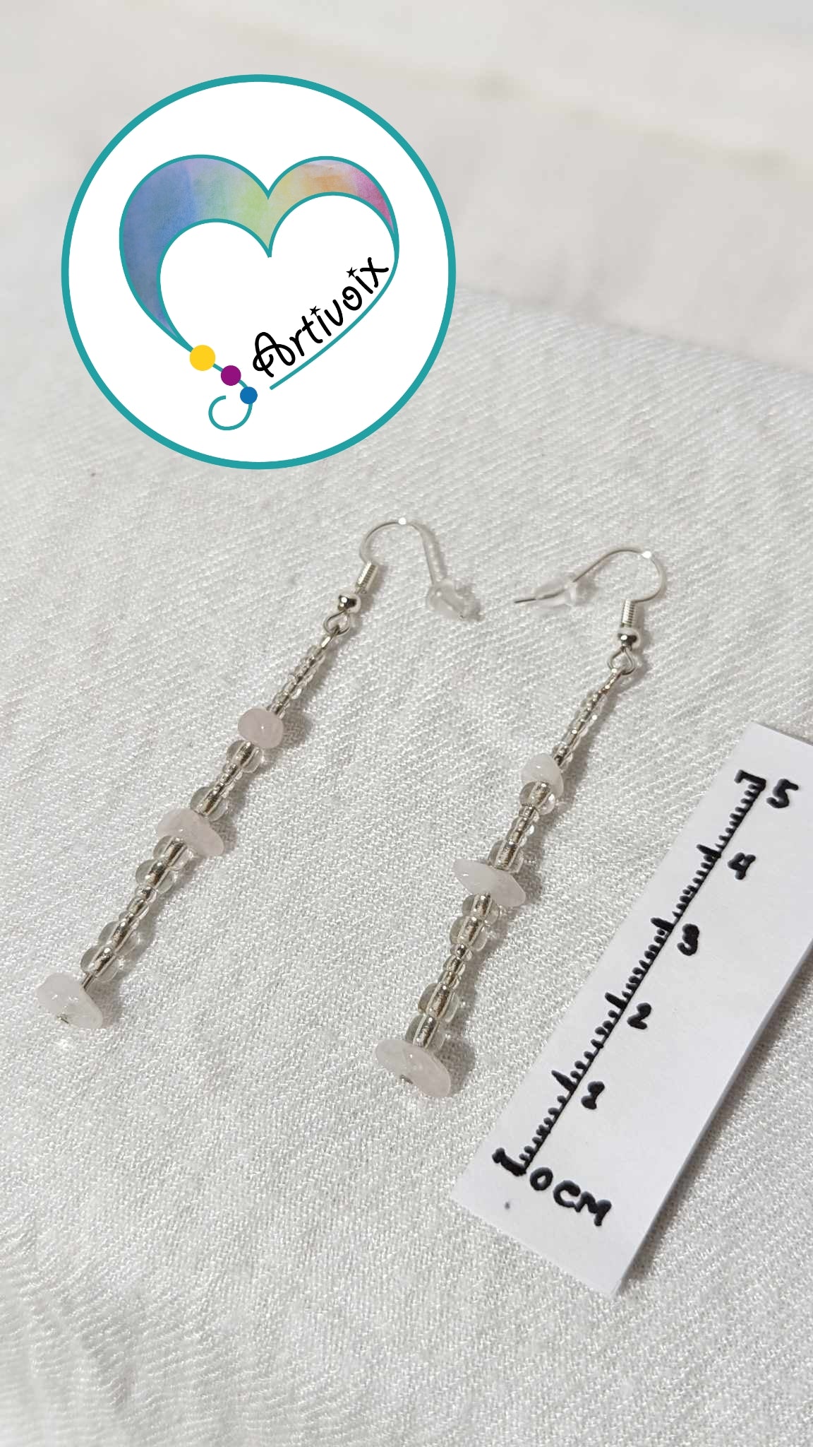 Clear pearl earrings.